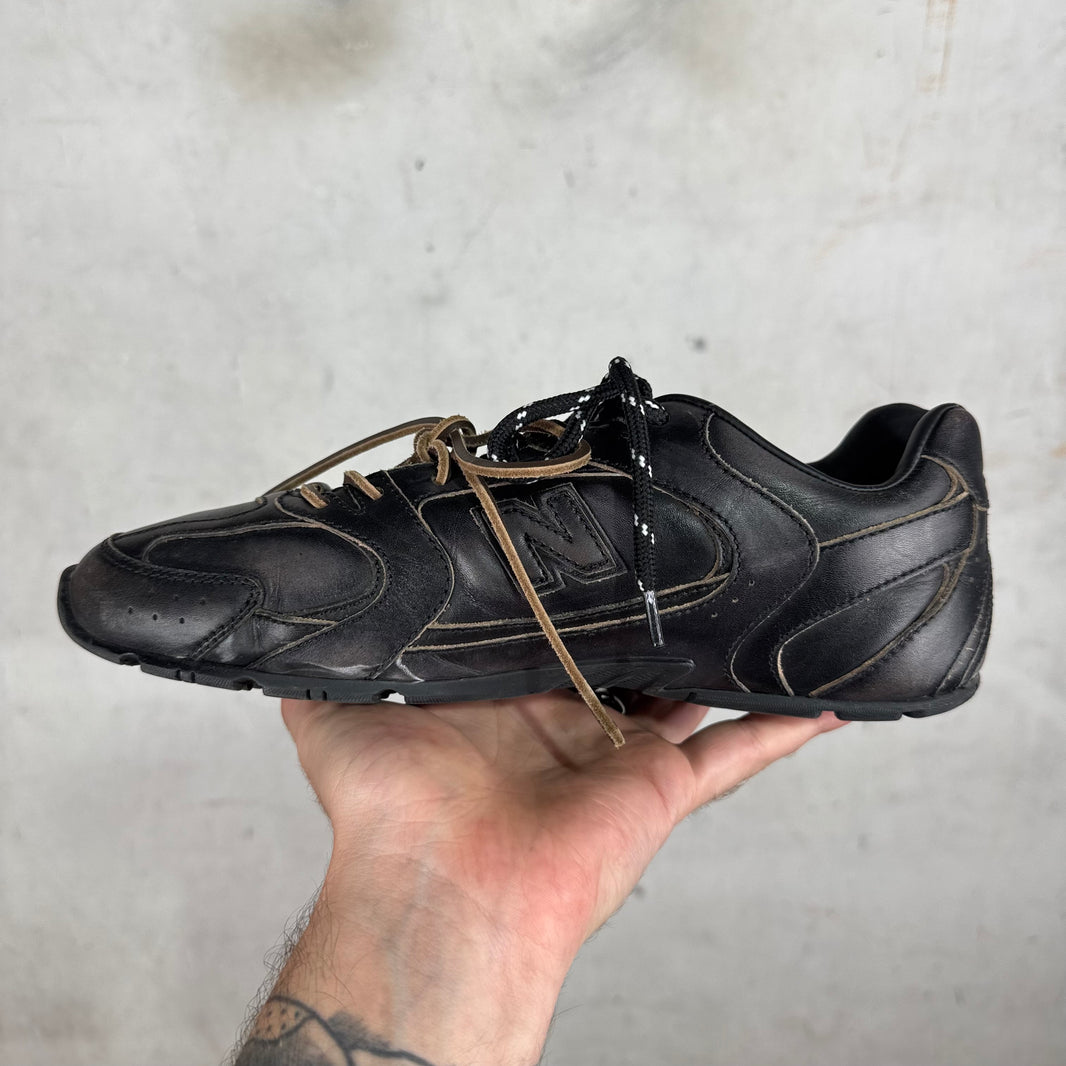 Miu Miu 
Black Leahter New Balance