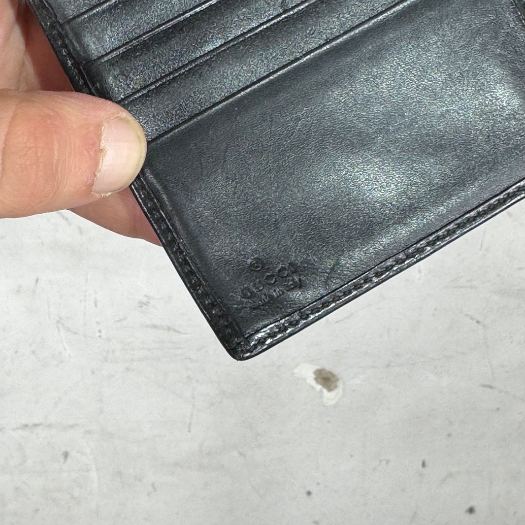 Gucci Embossed Monogram Leather Snap Wallet