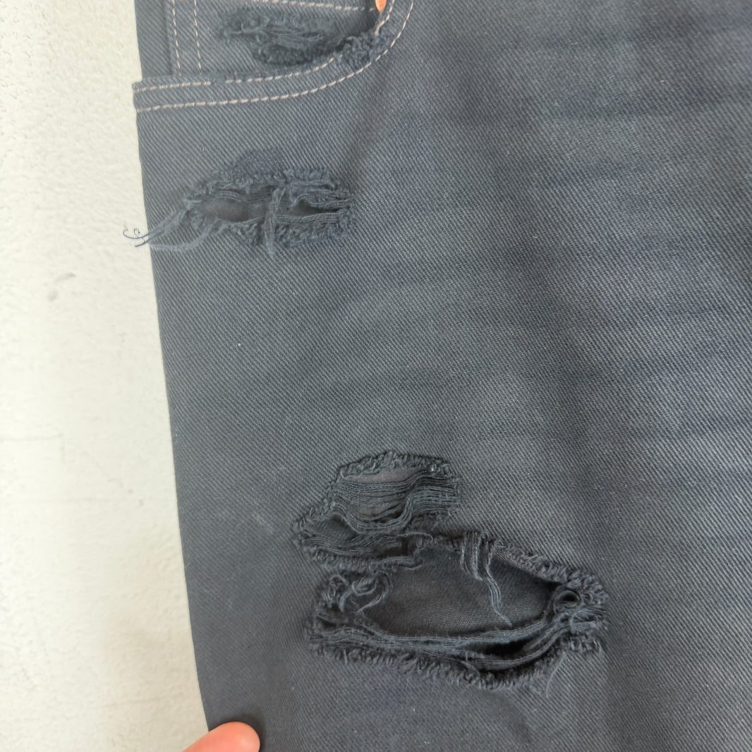 Balenciaga Italian Distressed Boot Cut Jeans