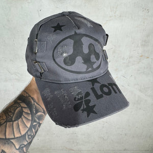Mowalola Distressed Buckle Hat