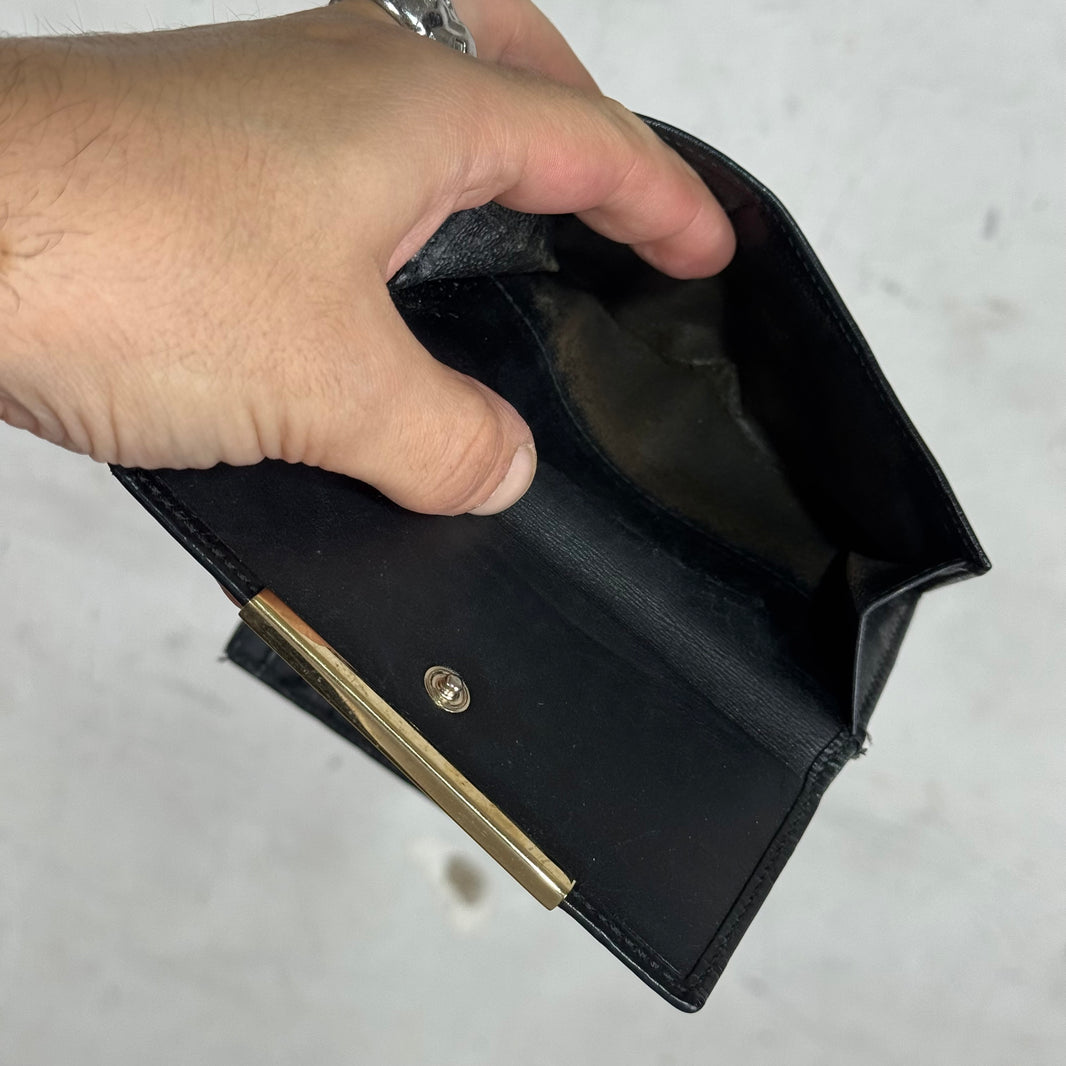 Gucci Embossed Monogram Leather Snap Wallet