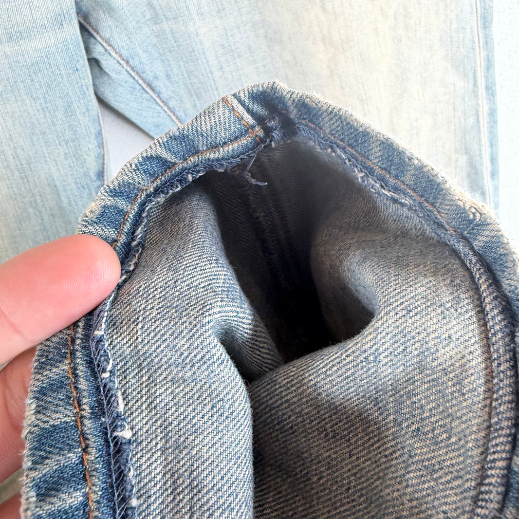 DIor Light Wash Skinny Jeans