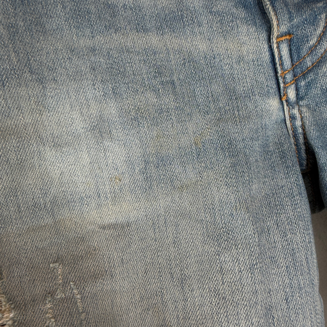 Amiri Distressed Blue Skinny Jeans