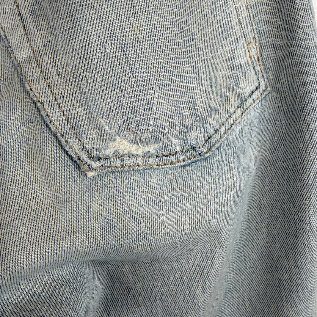 Saint Laurent Light Wash Repaired D18 Denim Jeans
