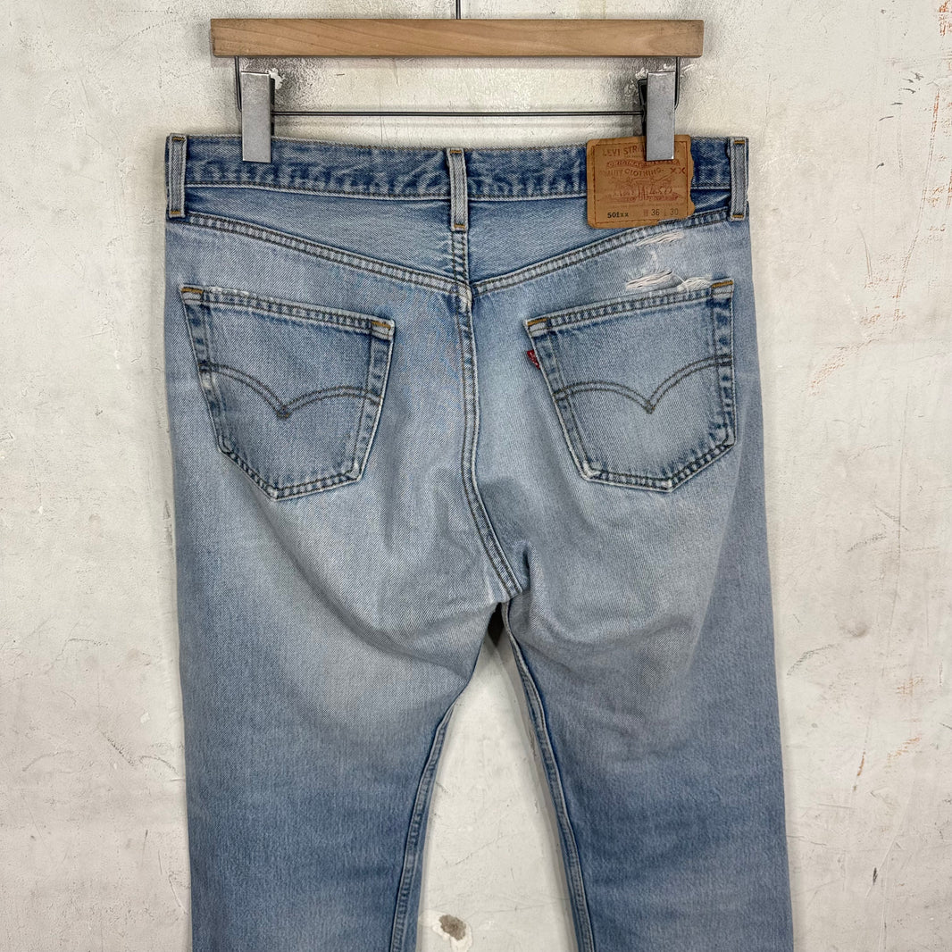 Vintage Levis 501xx Medium Wash Ripped Jeans