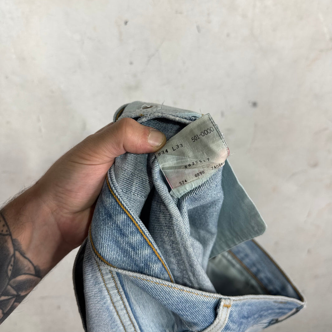 Vintage Levis 501 Lightwash Knee Rip Repair Jeans