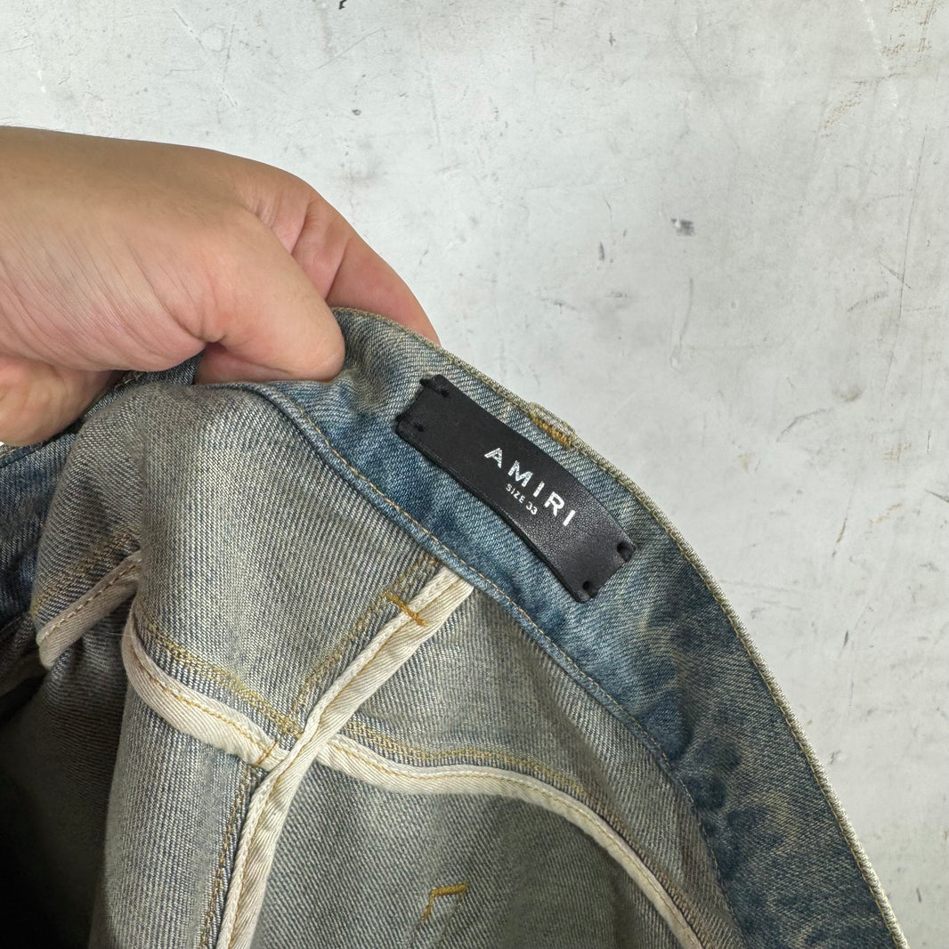 Amiri Lightwash Patched Carpenter Jeans