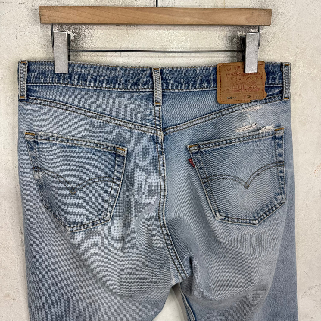 Vintage Levis 501xx Medium Wash Ripped Jeans