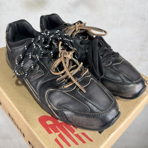 Miu Miu 
Black Leahter New Balance