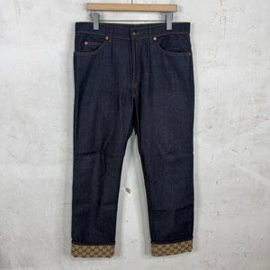 Gucci Monogram Cuffed Raw Jeans