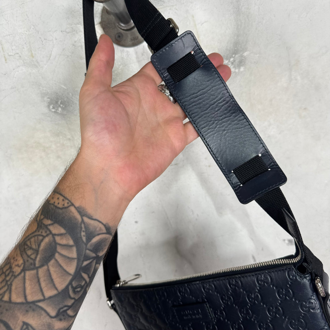 Gucci Monogram Embossed Messenger Bag