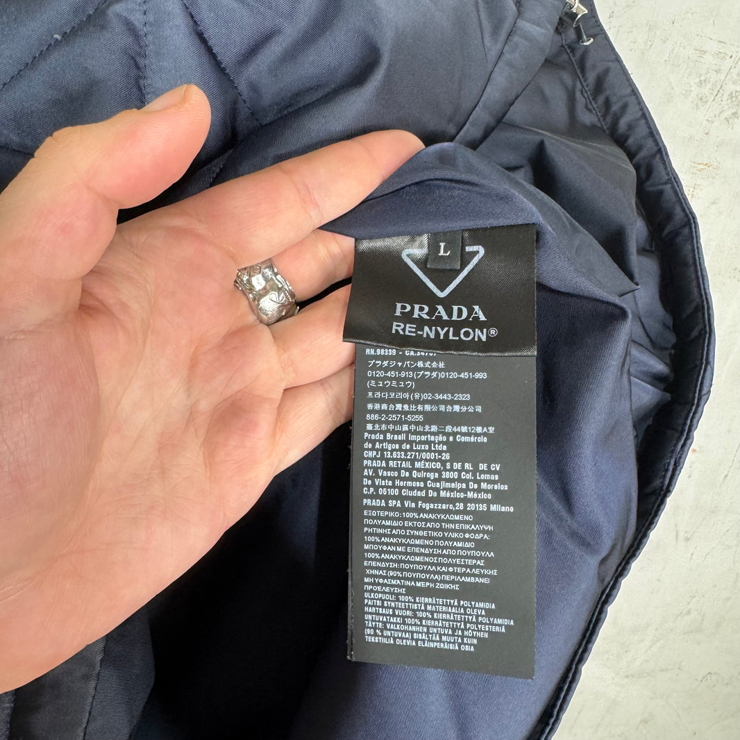 Prada Quilted Distressed Logo Puffer Jacket
