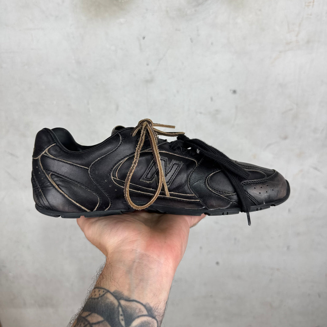 Miu Miu 
Black Leahter New Balance