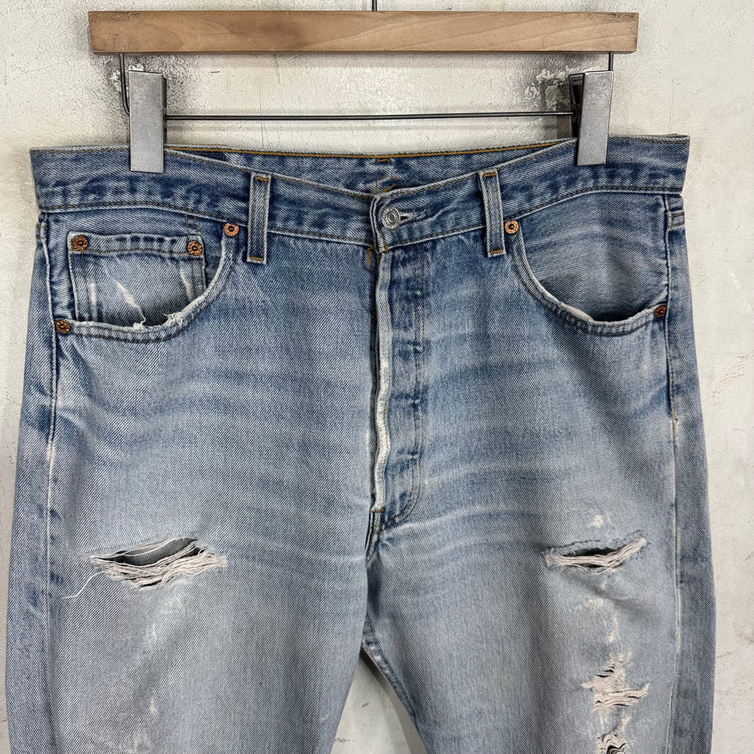 Vintage Levis 501xx Medium Wash Ripped Jeans