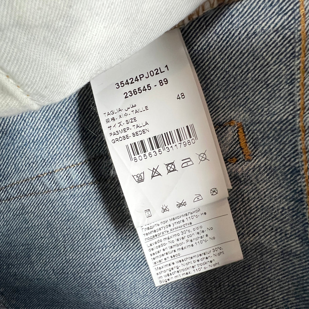 424 Distressed Light Wash Denim Jeans