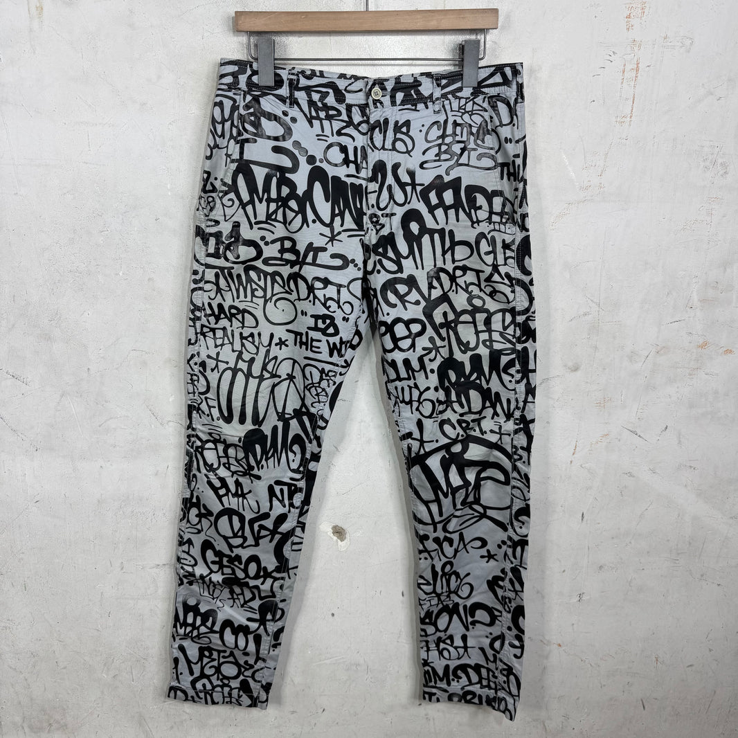 CDG Printed Script Trousers