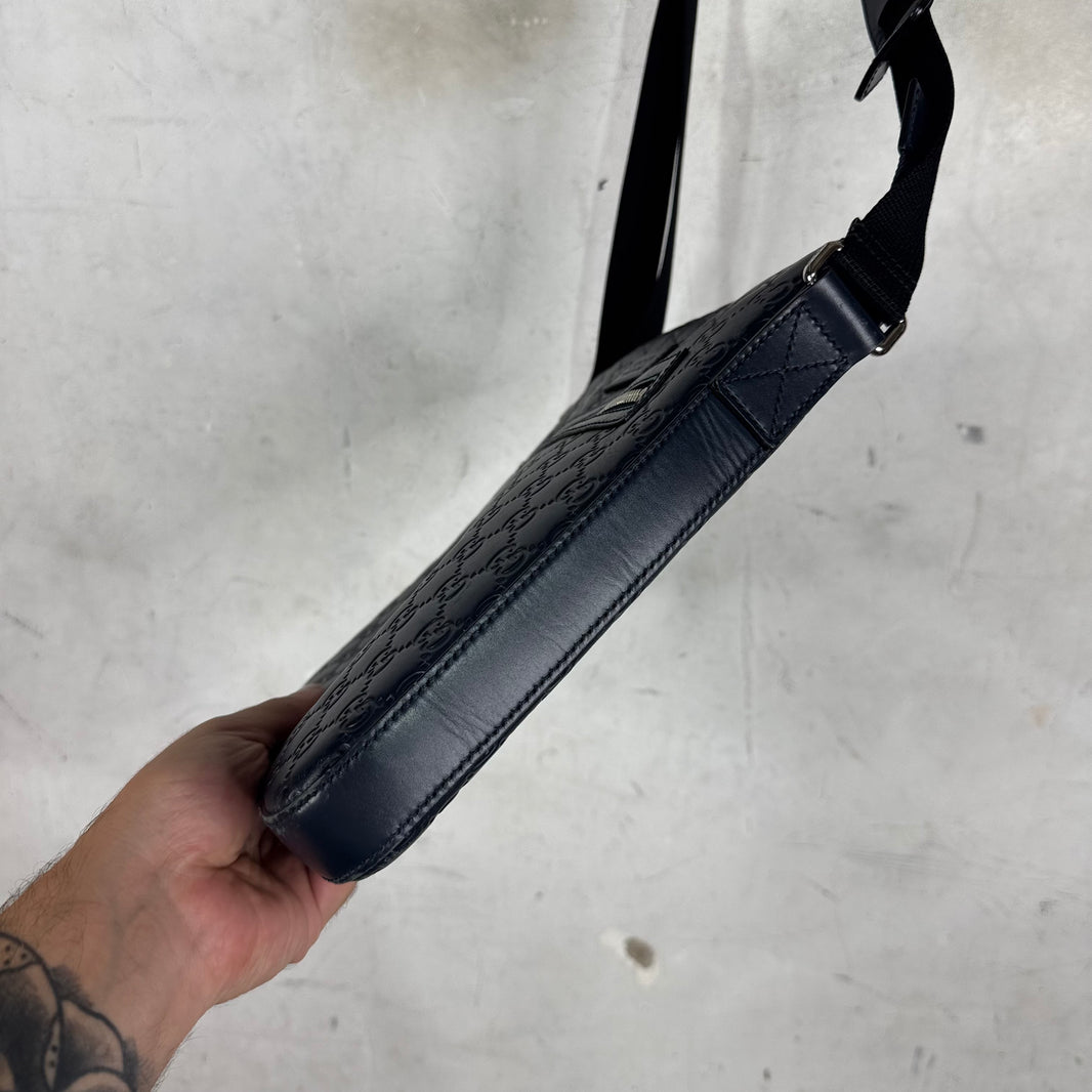 Gucci Monogram Embossed Messenger Bag