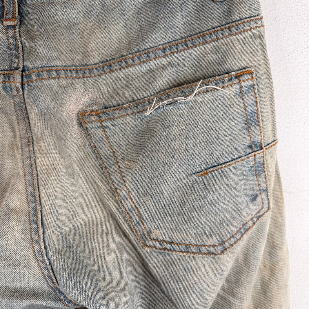 DIor Light Wash Skinny Jeans