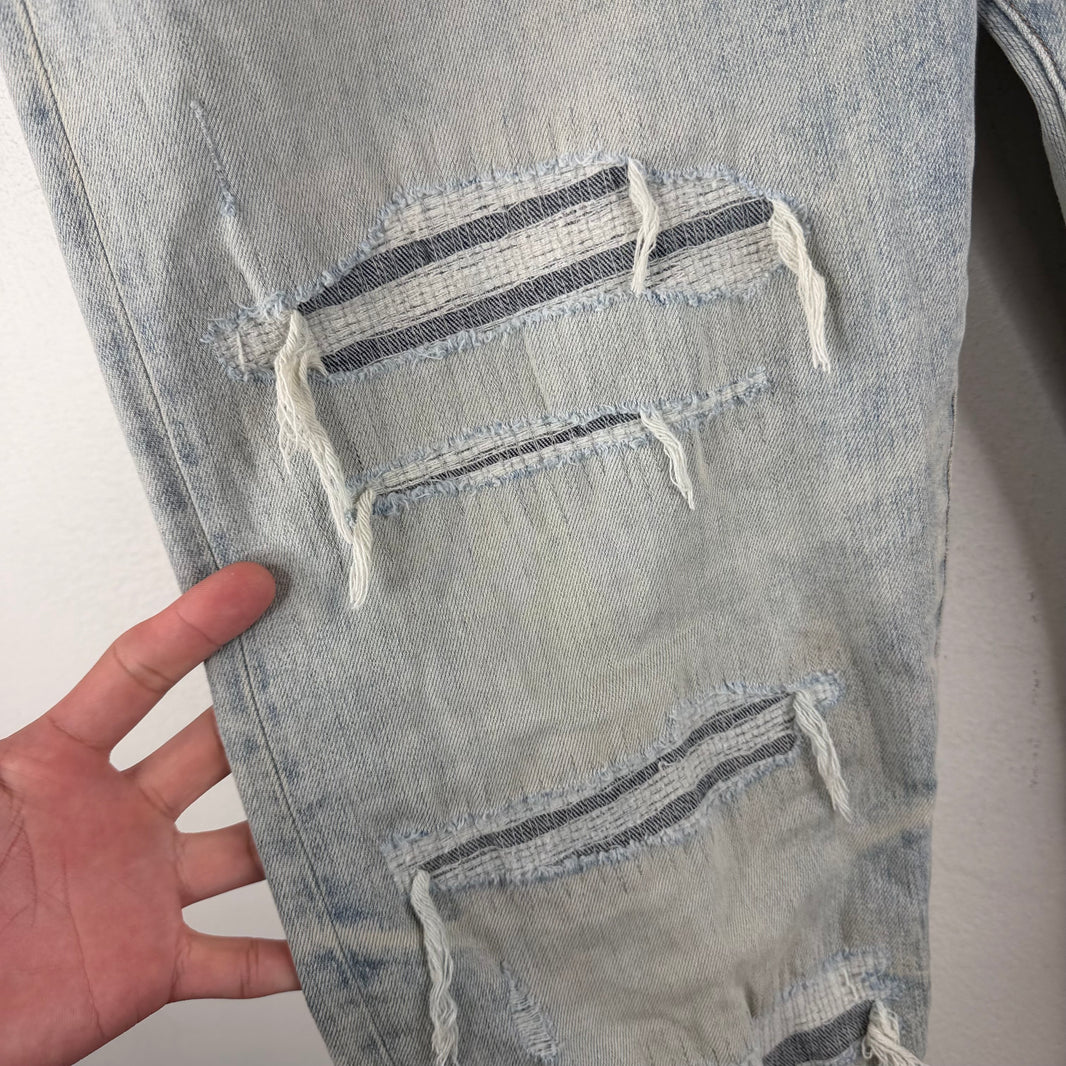 Amiri Patches Skinny Jeans