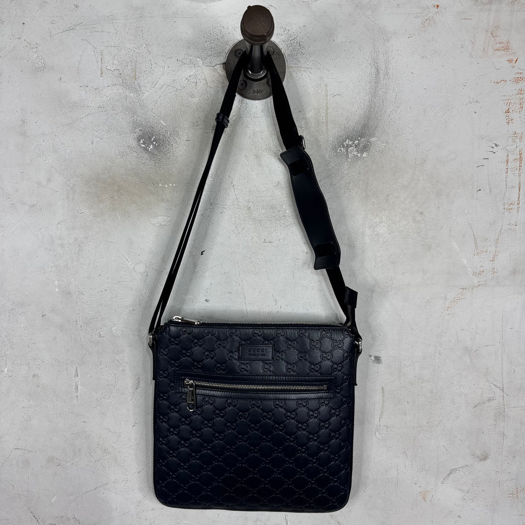 Gucci Monogram Embossed Messenger Bag