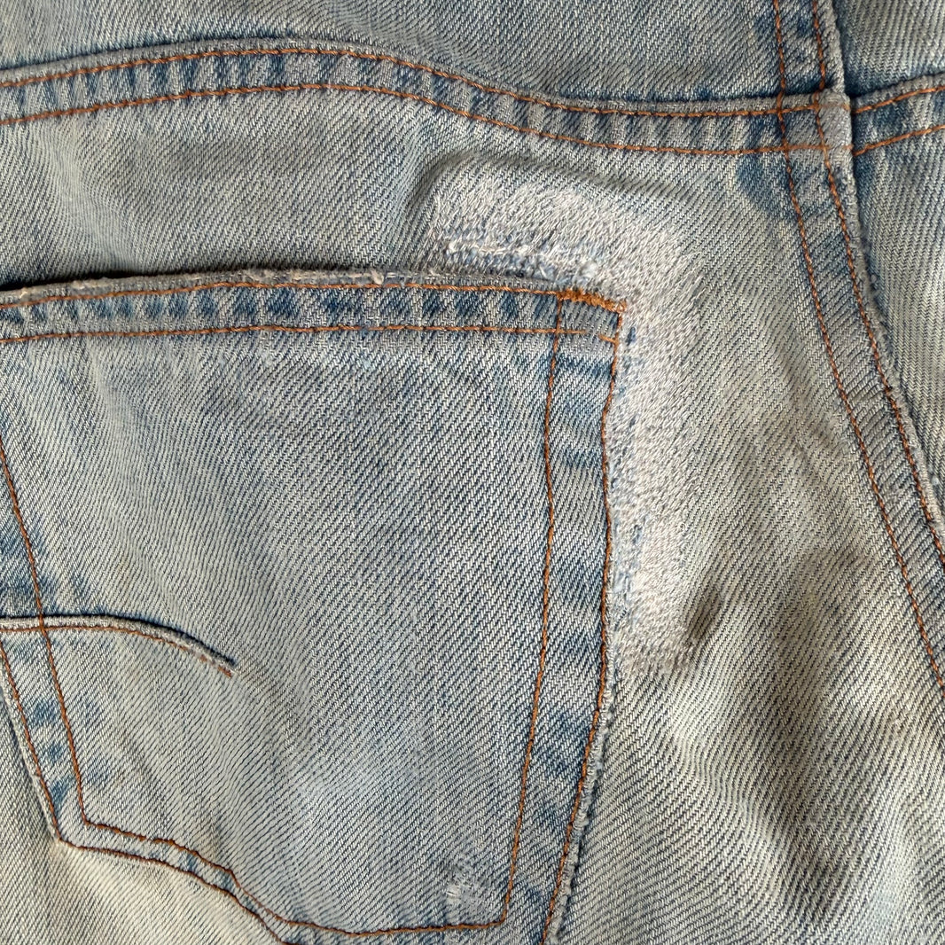 DIor Light Wash Skinny Jeans