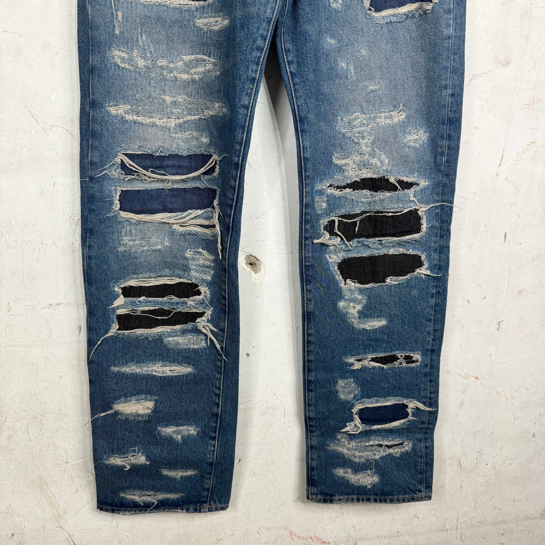 424 Distressed & Repaired Jeans