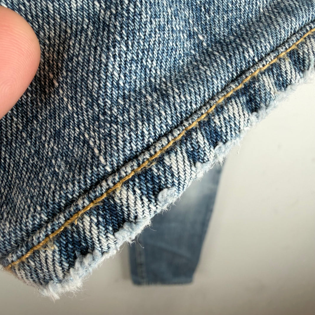 Saint Laurent Light Washed Repaired D02 Jeans