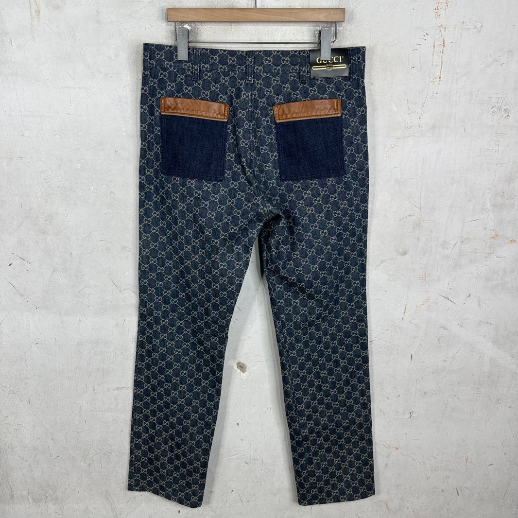 Gucci Denim Monogram Leather Trimmed Jeans