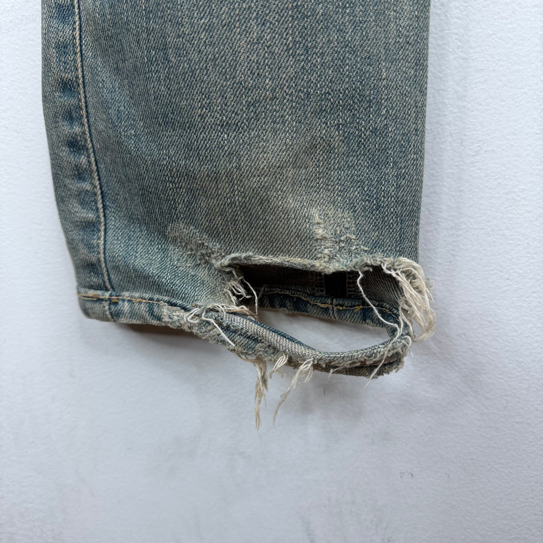 Saint Laurent D02 Washed Light Blue Distressed Jeans