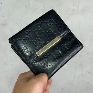 Gucci Embossed Monogram Leather Snap Wallet