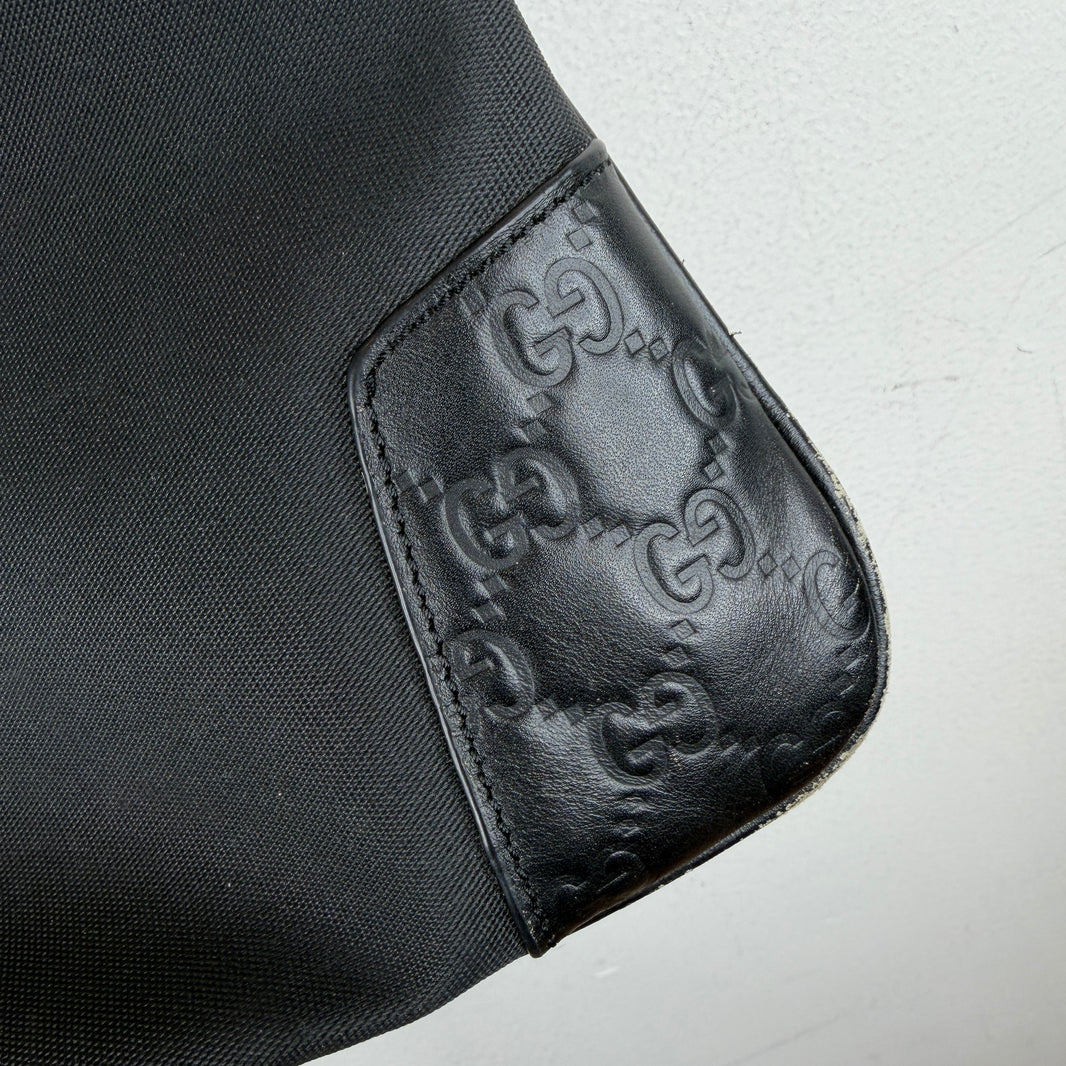 Gucci Leather Monogram Messenger Bag