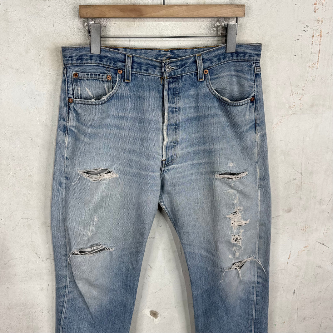 Vintage Levis 501xx Medium Wash Ripped Jeans