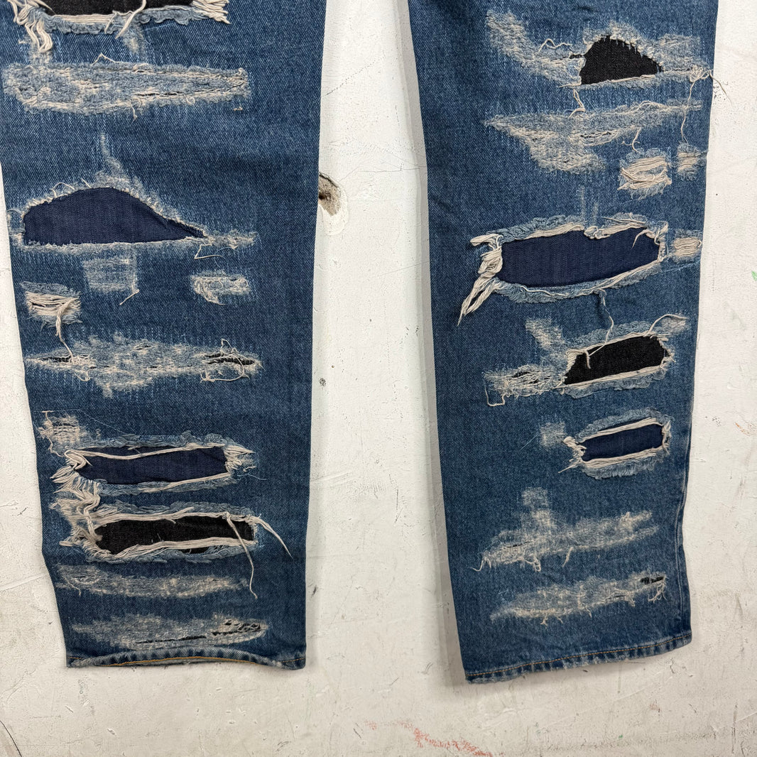 424 Distressed & Repaired Jeans