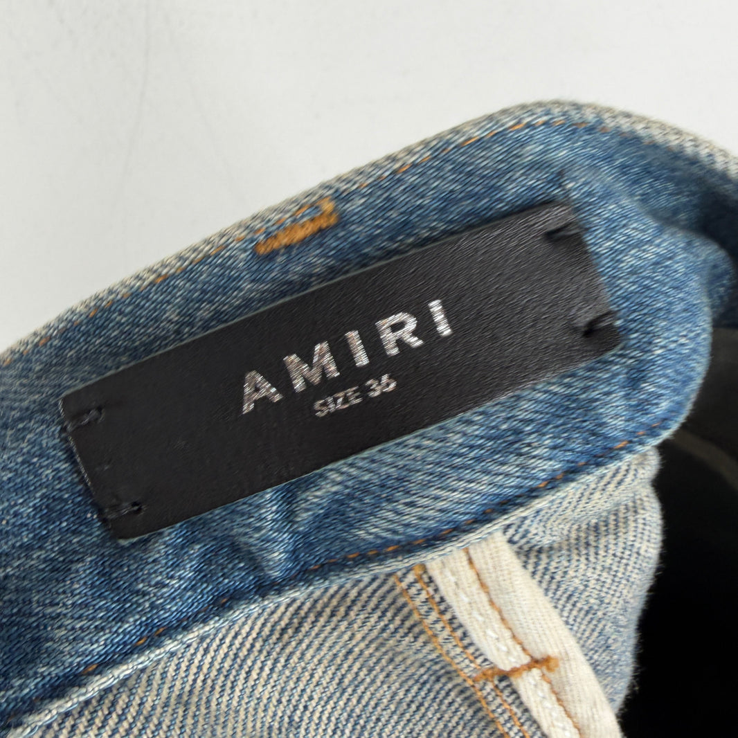 Amiri Wide Leg Distressed Jeans