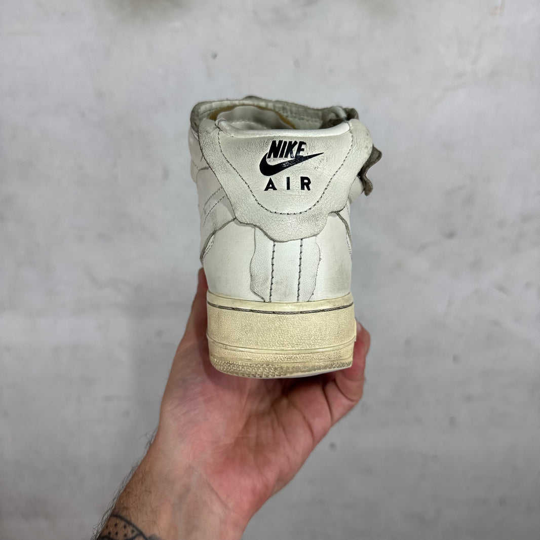 Nike x CDG White Leather AF1's