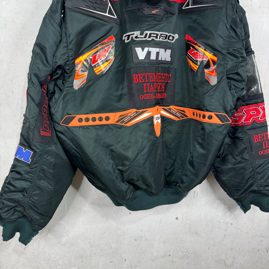 Vetements x Alpha Patchwork Racer Hooded Bomber Jacket