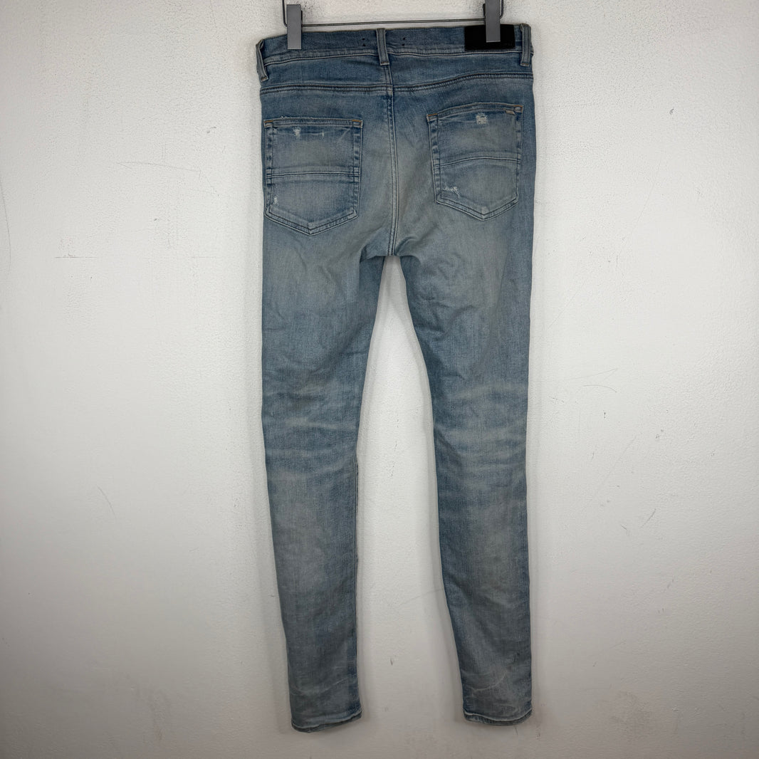 Amiri Distressed Blue Skinny Jeans