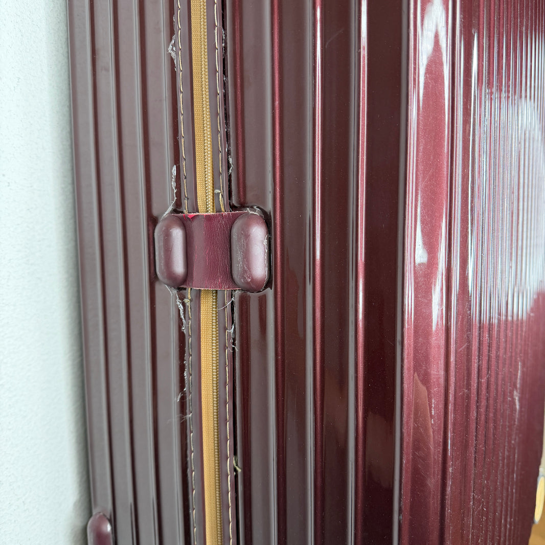 Rimowa Burgundy Check-In Suitcase