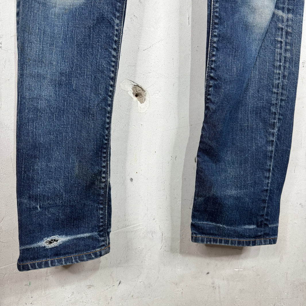 Prada Repaired Tapered Cut Jeans