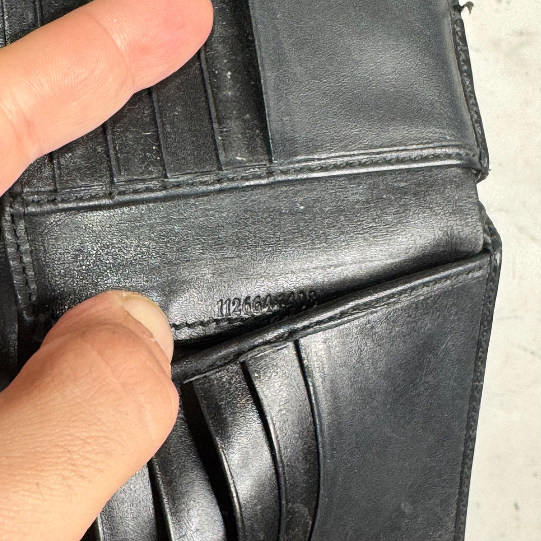 Gucci Embossed Monogram Leather Snap Wallet