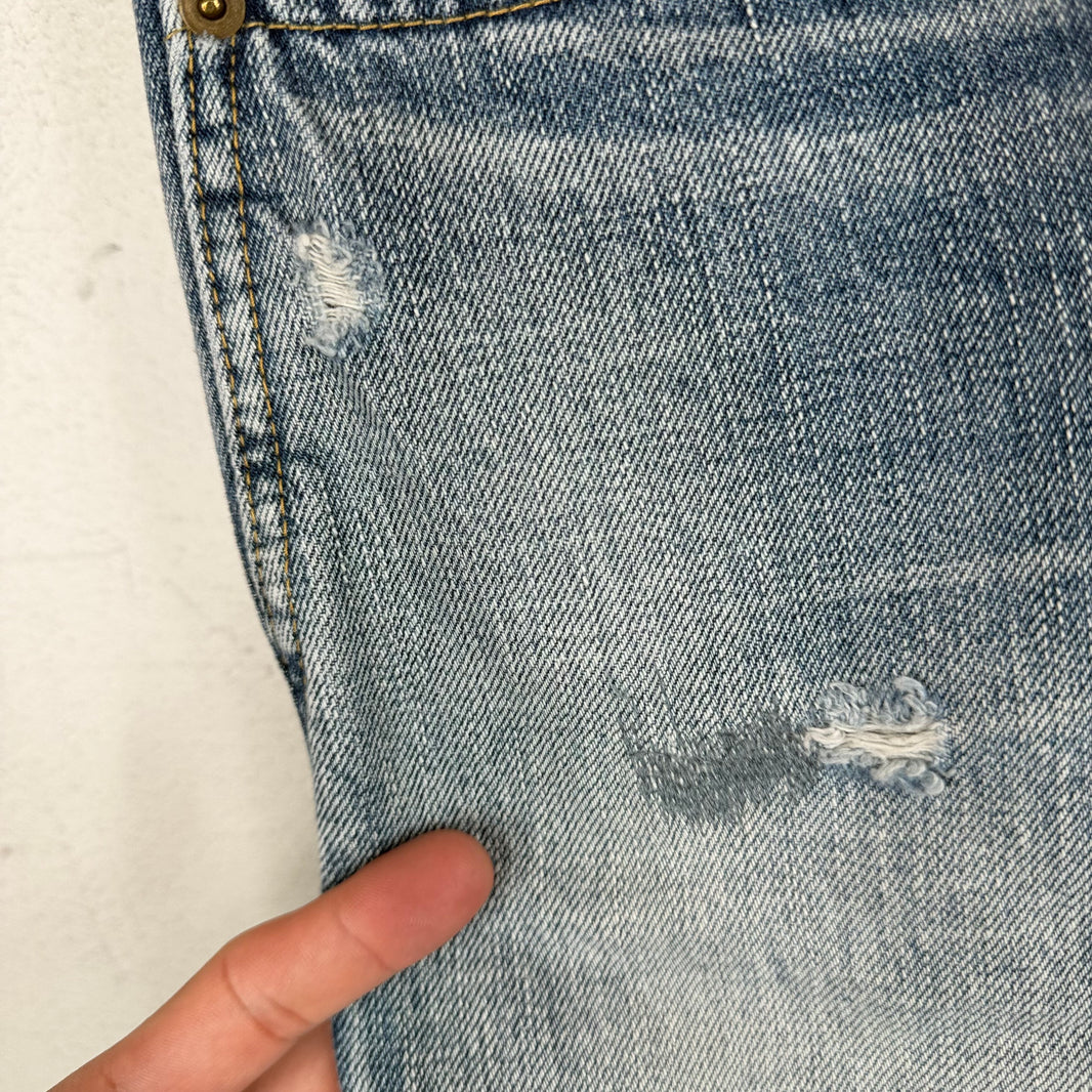 Saint Laurent Light Washed Repaired D02 Jeans