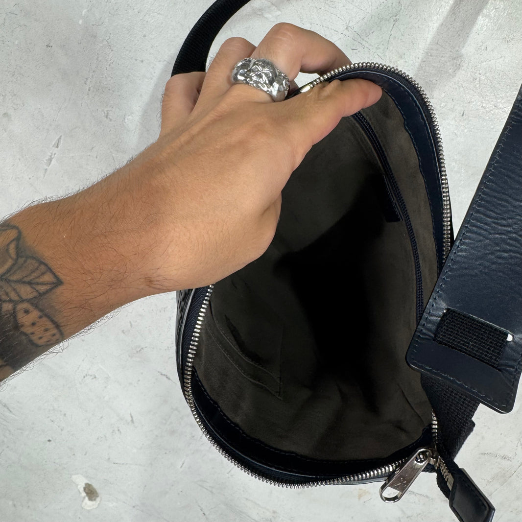 Gucci Monogram Embossed Messenger Bag