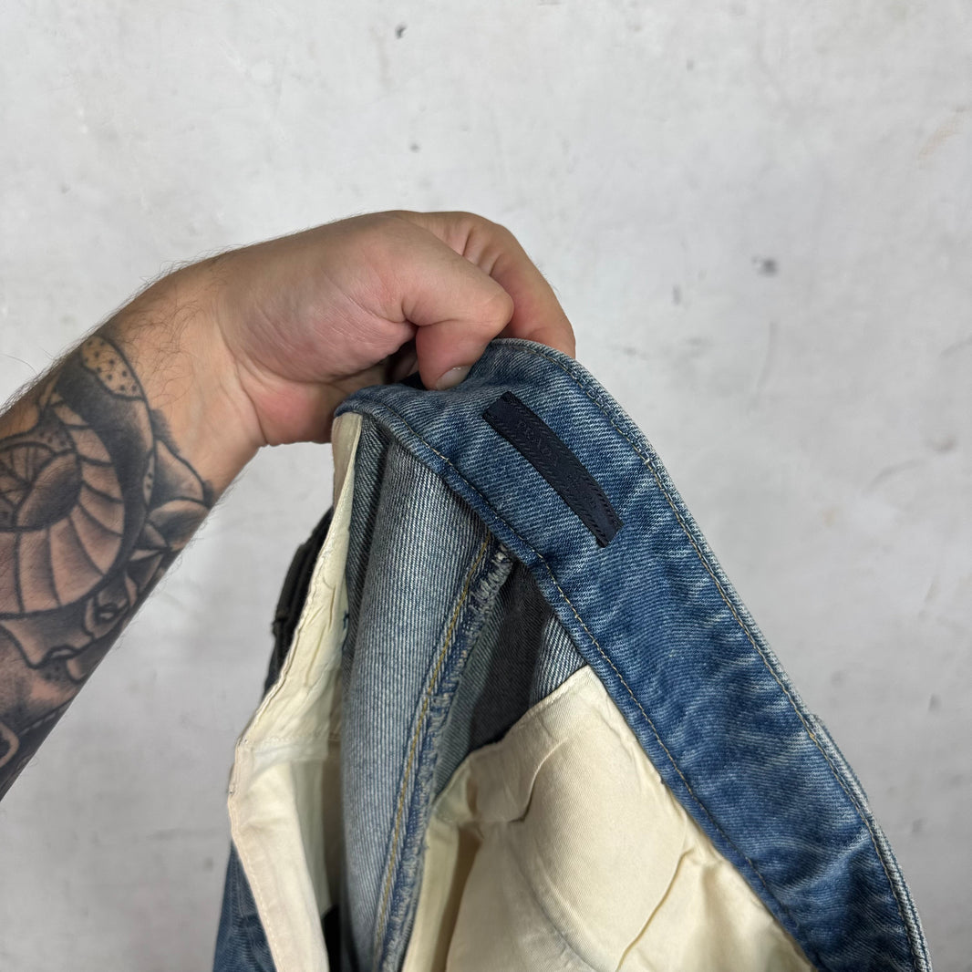 Prada Medium Wash Plaqued Denim Shorts
