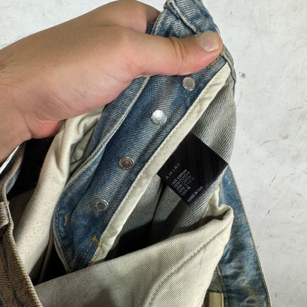 Amiri Lightwash Patched Carpenter Jeans