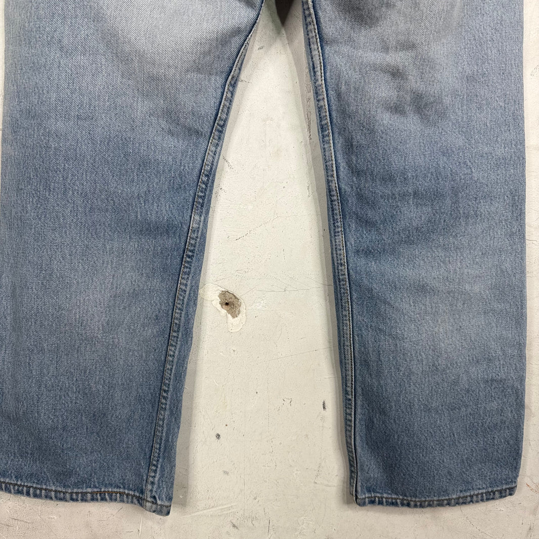 Vintage Levis 501xx Medium Wash Ripped Jeans