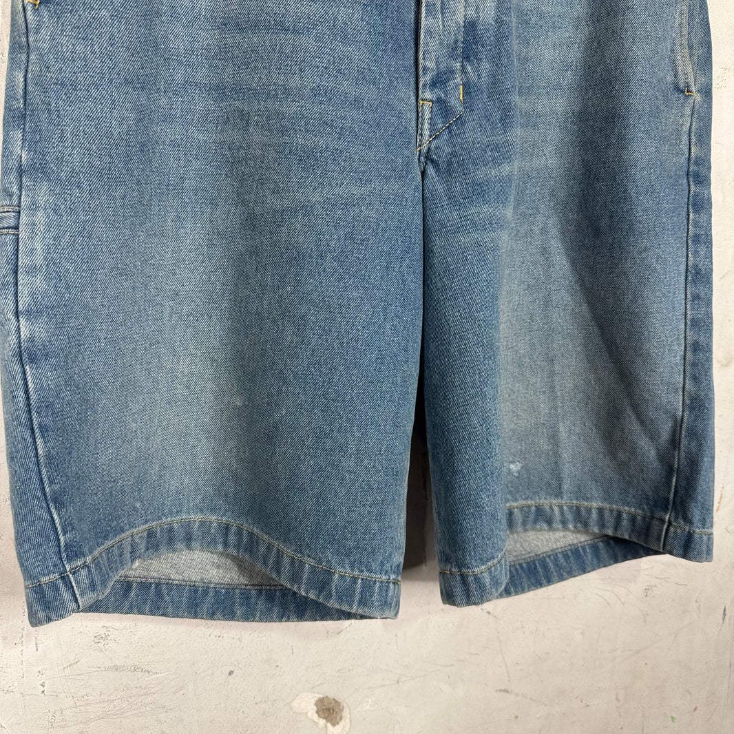Prada Medium Wash Plaqued Denim Shorts