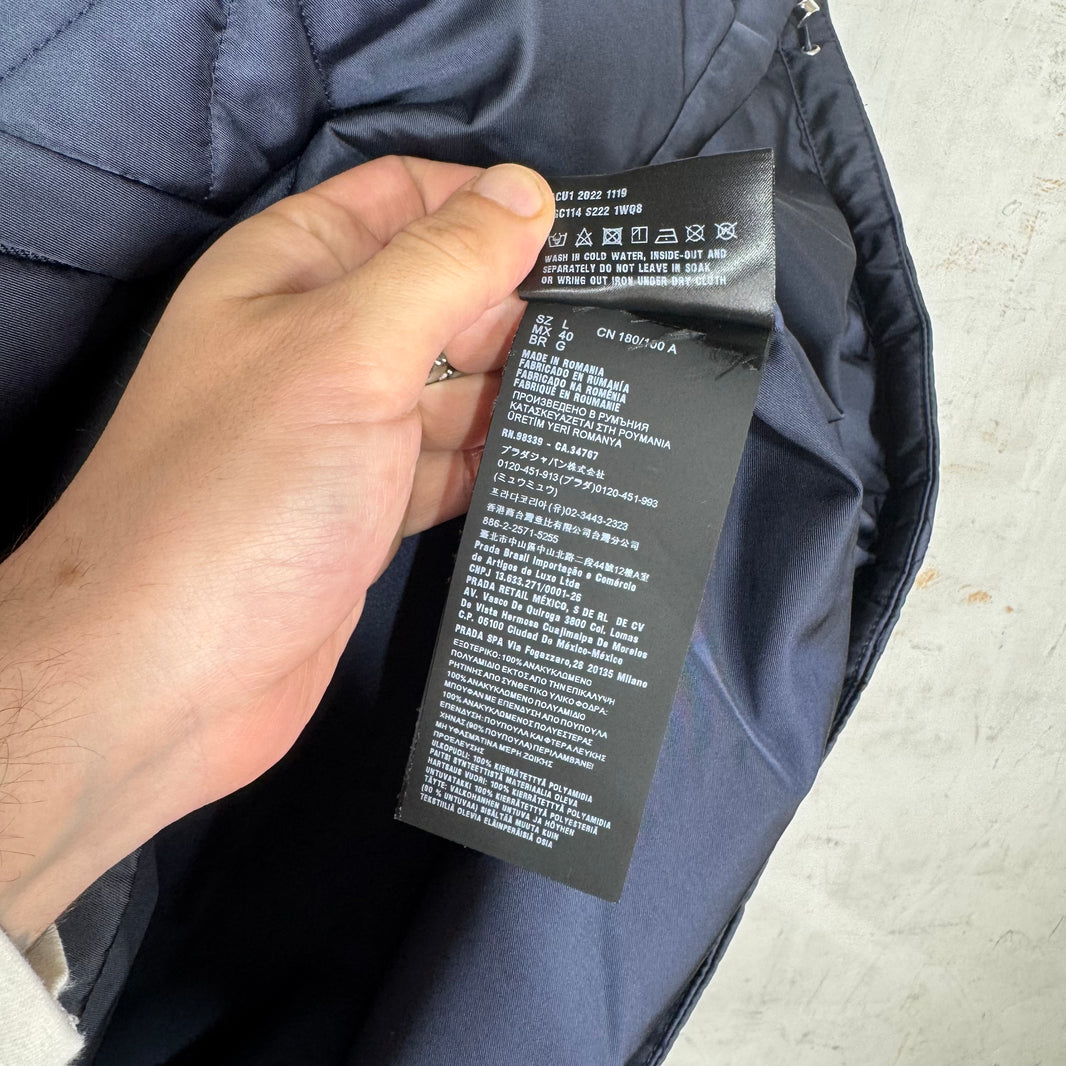 Prada Quilted Distressed Logo Puffer Jacket