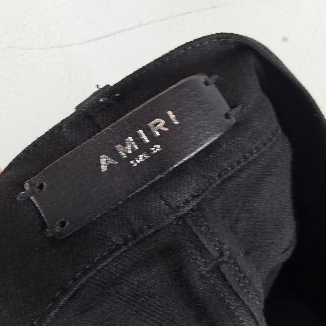 Amiri Waxed Skinny Jeans