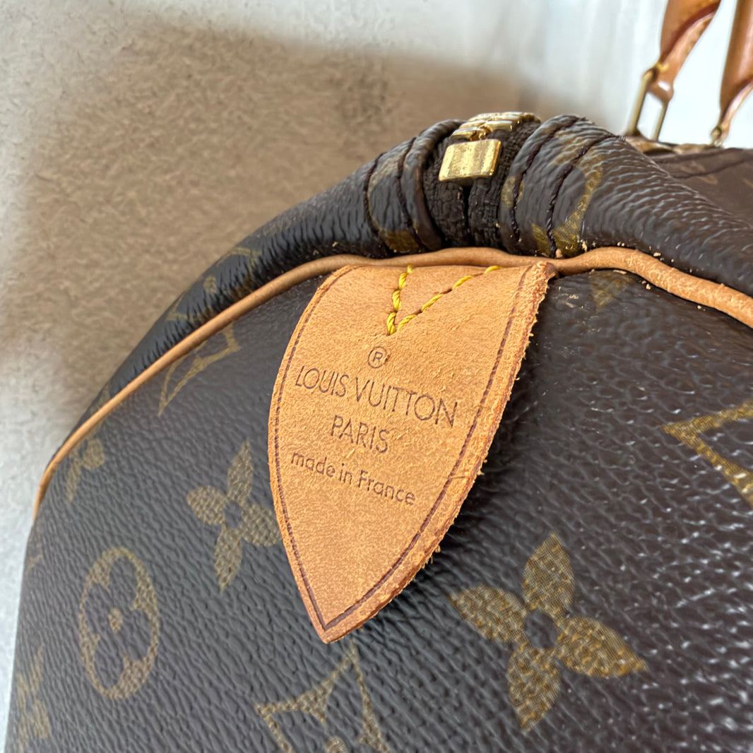 Louis Vuitton Vintage Monogram Keepall 55 Bag