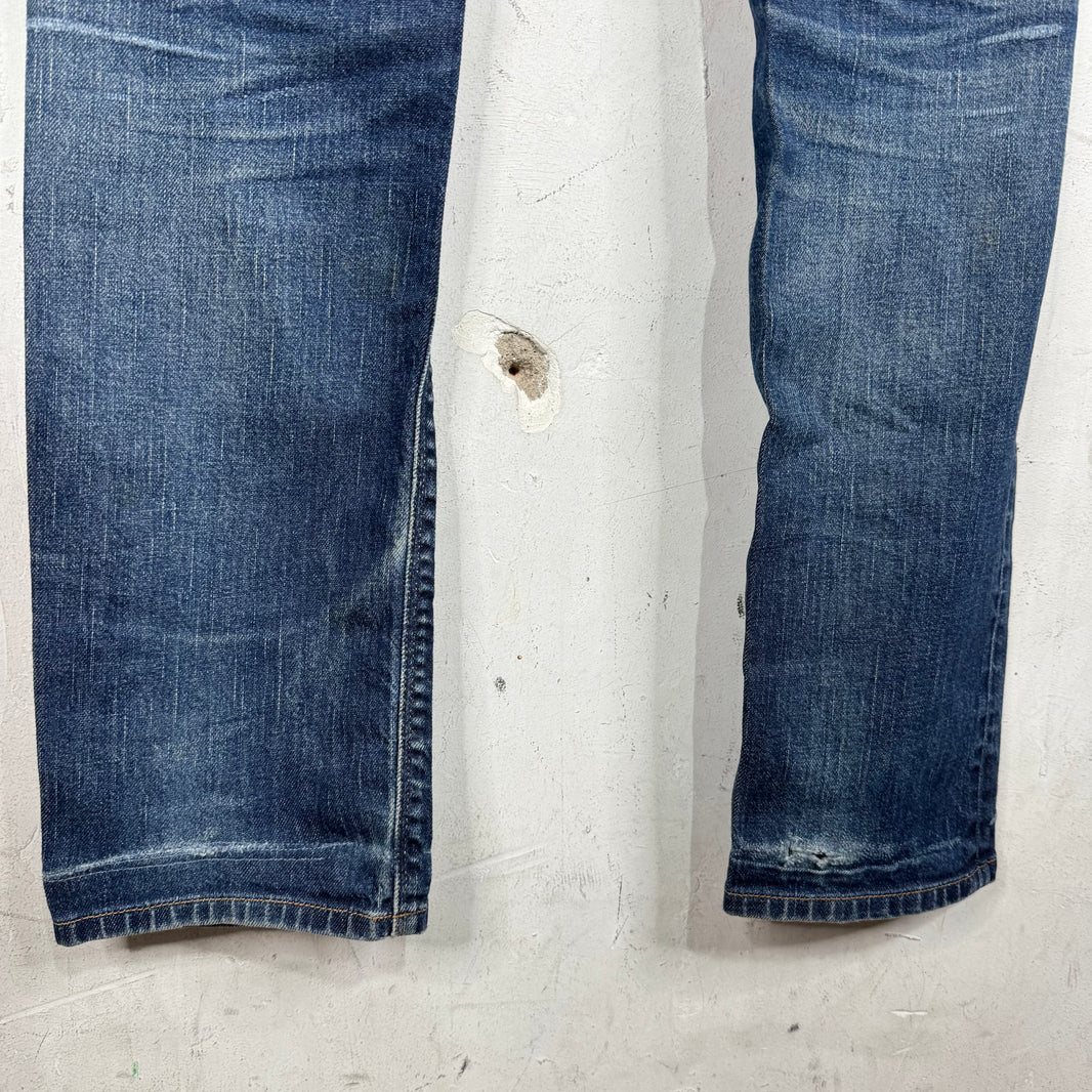 Prada Repaired Tapered Cut Jeans